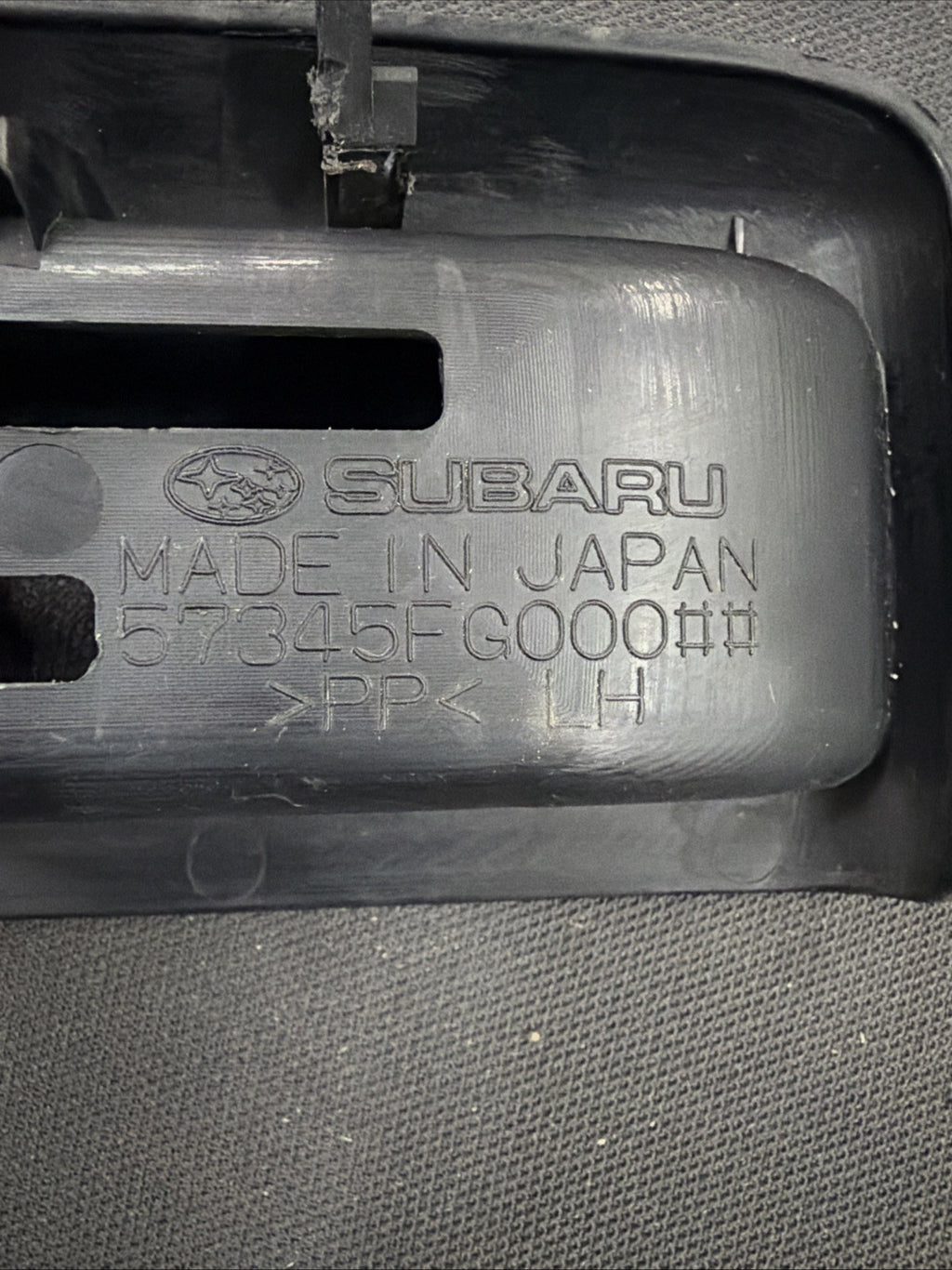 08-14 OEM Subaru Interior Locking Mechanism Cover Trim 57345FG000 Gas Door Trunk