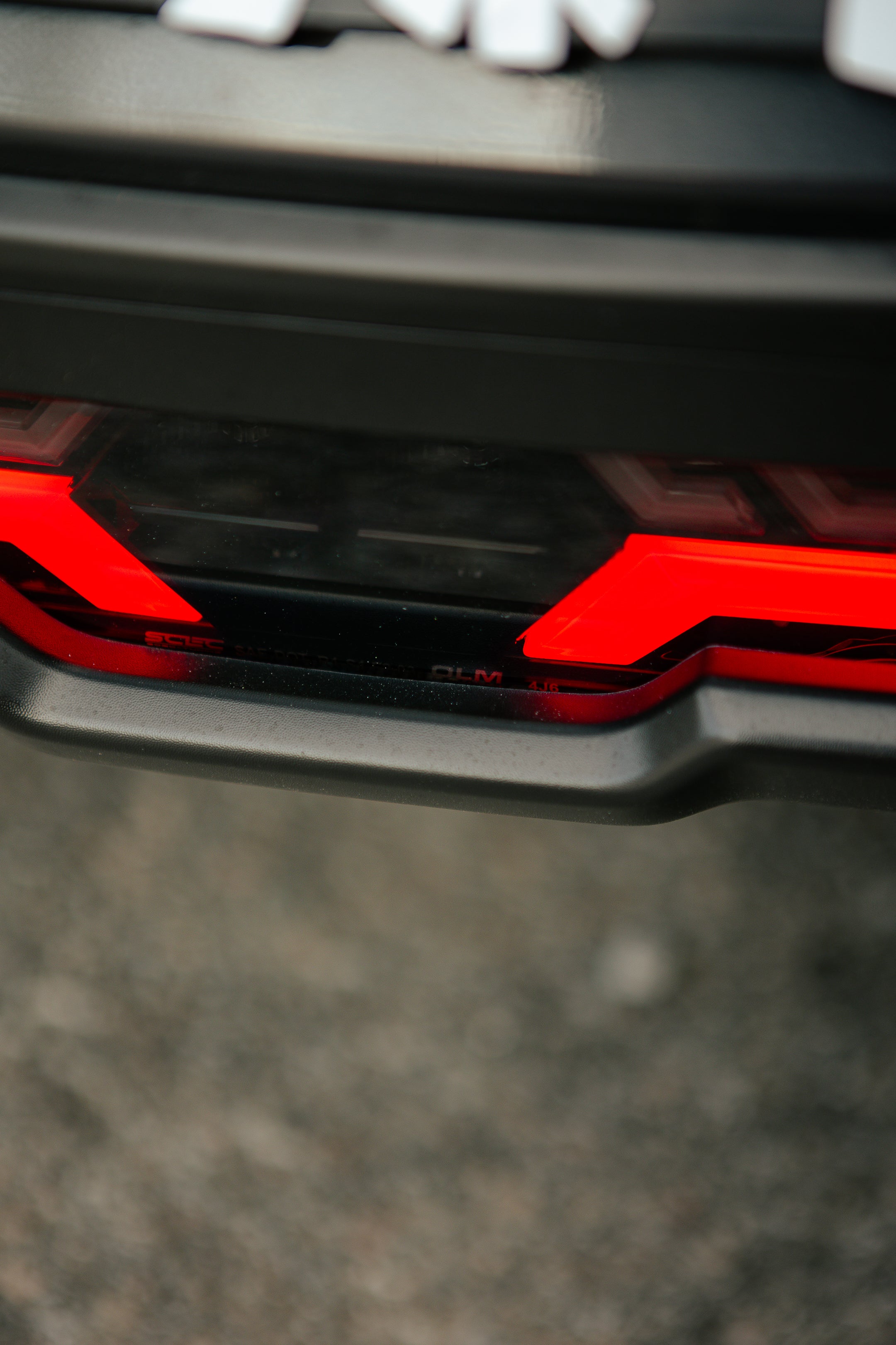 OLM V2 F1 Rear Fog Light (Smoke Lens, Black Base, Red Bar) - 2022 BRZ / GR86